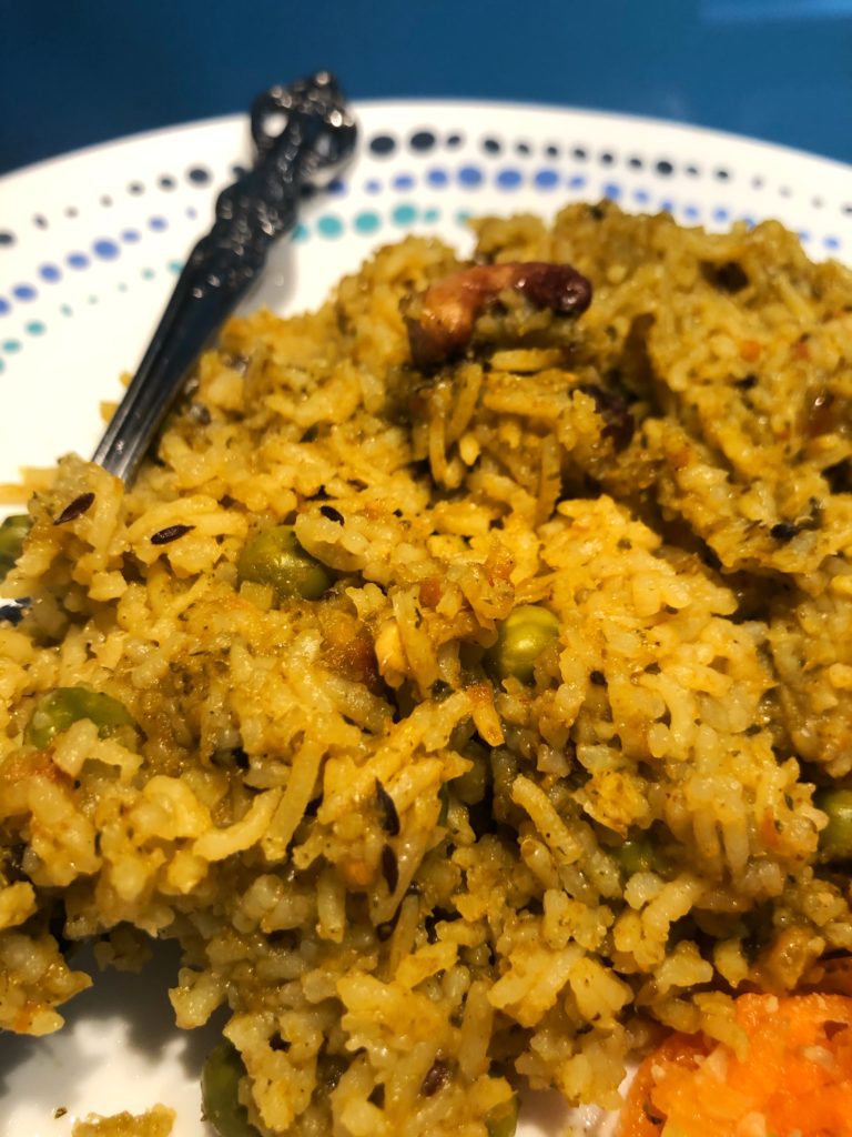 Masale Bhaat - a fragrant rice dish served alongside a carrot salad