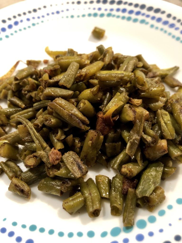 French beans on a white plate