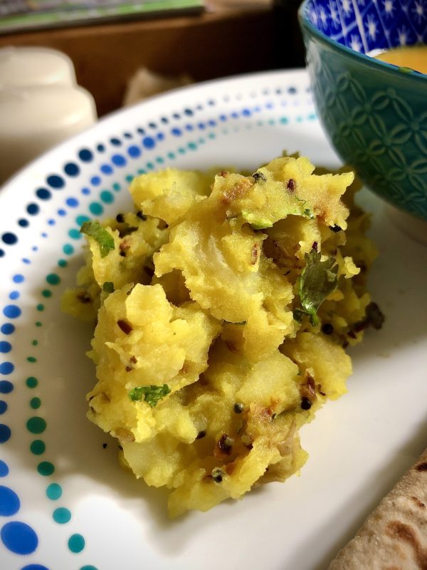 picnic potatoes with turmeric ginger garlic and green chillies