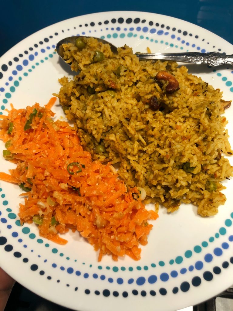 Masale Bhaat - a fragrant rice dish served alongside a carrot salad